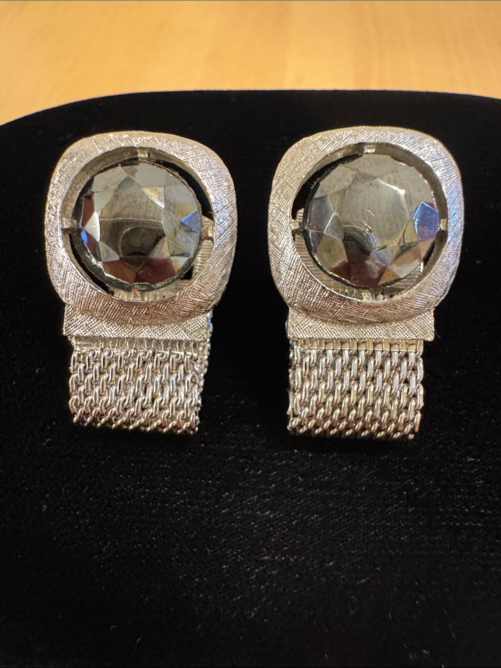 Vintage silver tone mesh wrap cufflinks with dark faceted glass centers